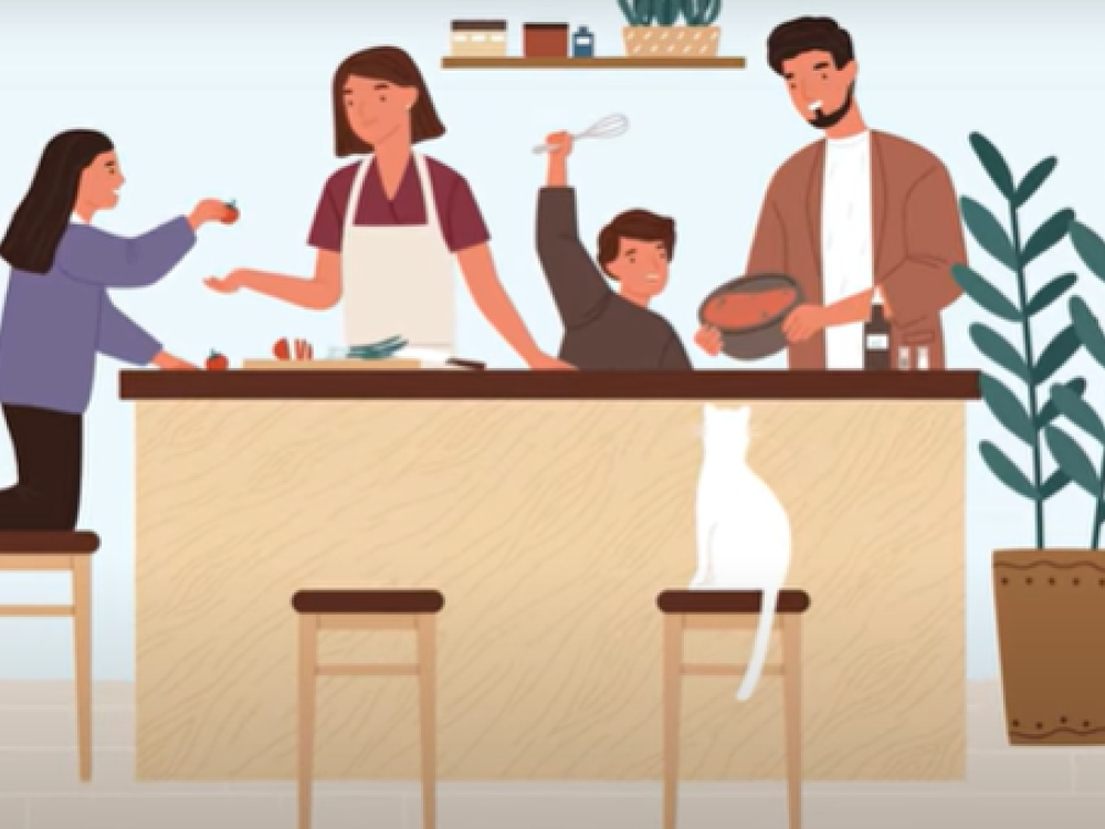  Illustration of a family cooking together in a kitchen, with two adults and two children at a counter, and a cat sitting on a stool.