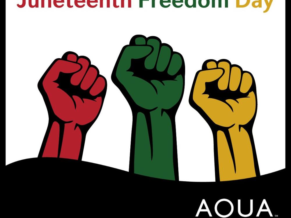 Graphic for Juneteenth Freedom Day with three raised fists in red, green, and yellow, and the AQUA logo at the bottom right corner.