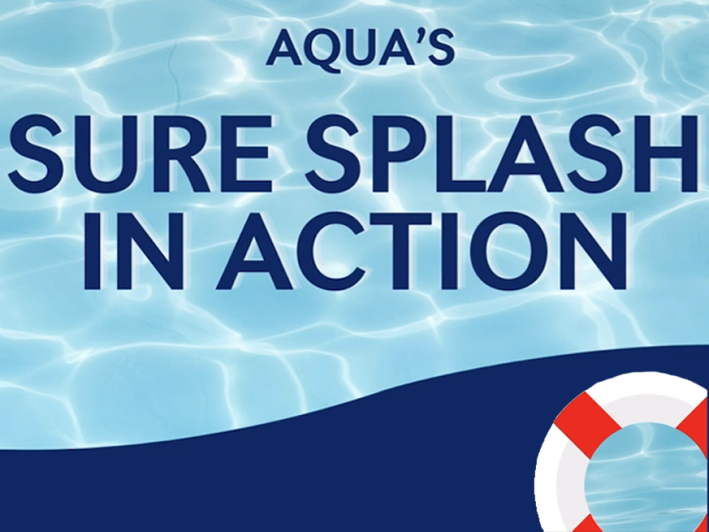 Graphic with text 'Aqua’s Sure Splash in Action' over a background of water ripples and a partial view of a lifebuoy in the corner.